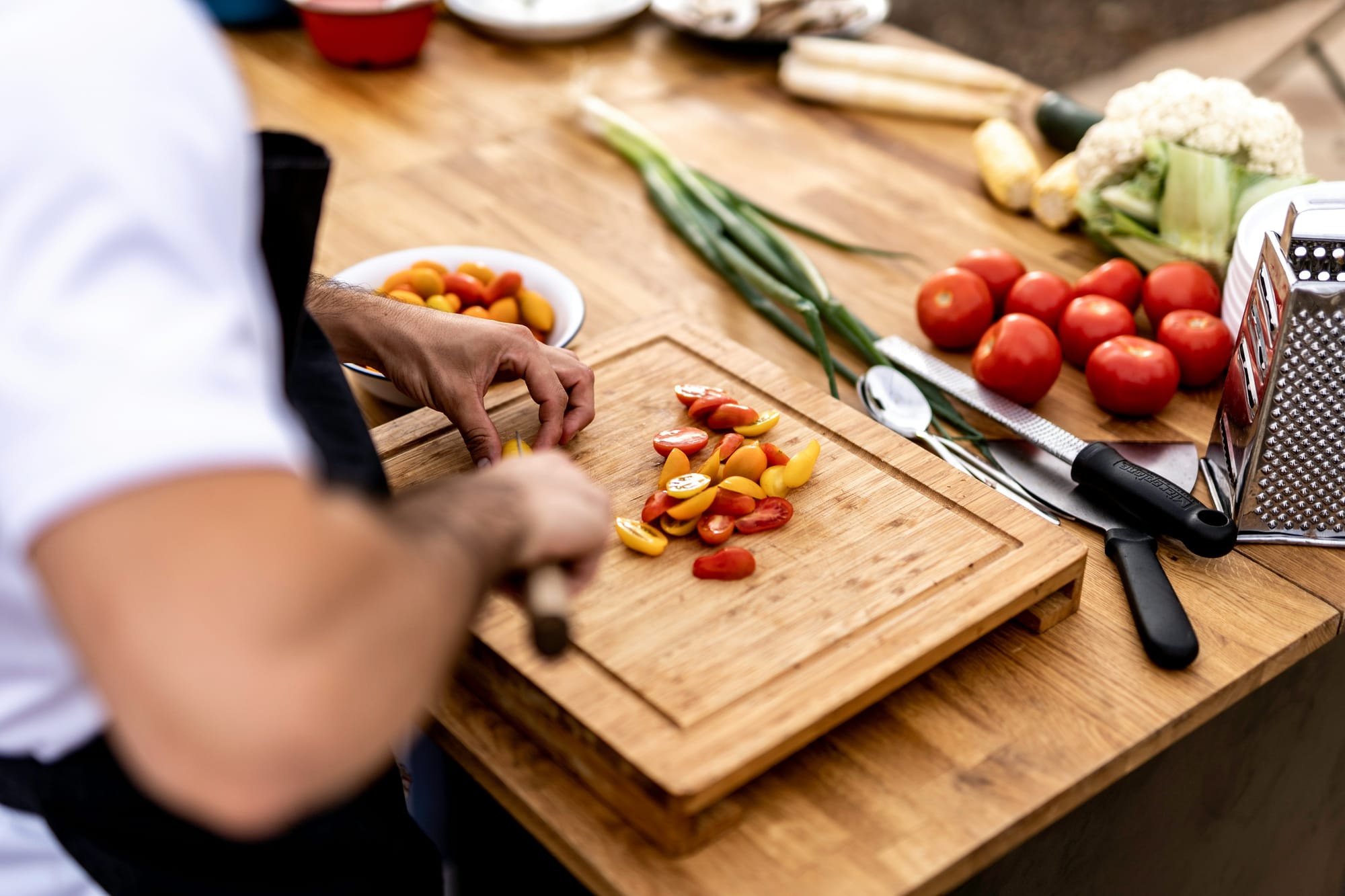 Personal chef preparing a meal in a client’s kitchen